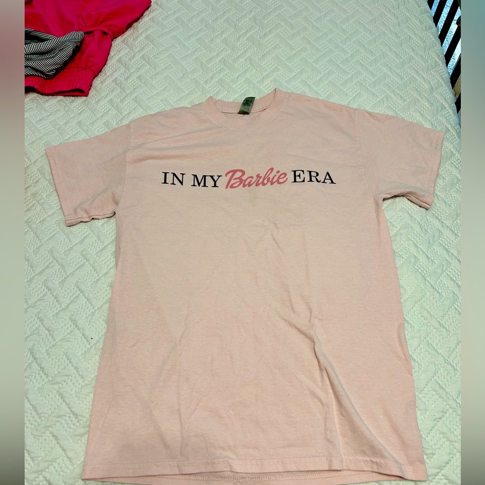 in my Barbie era shirt !!
